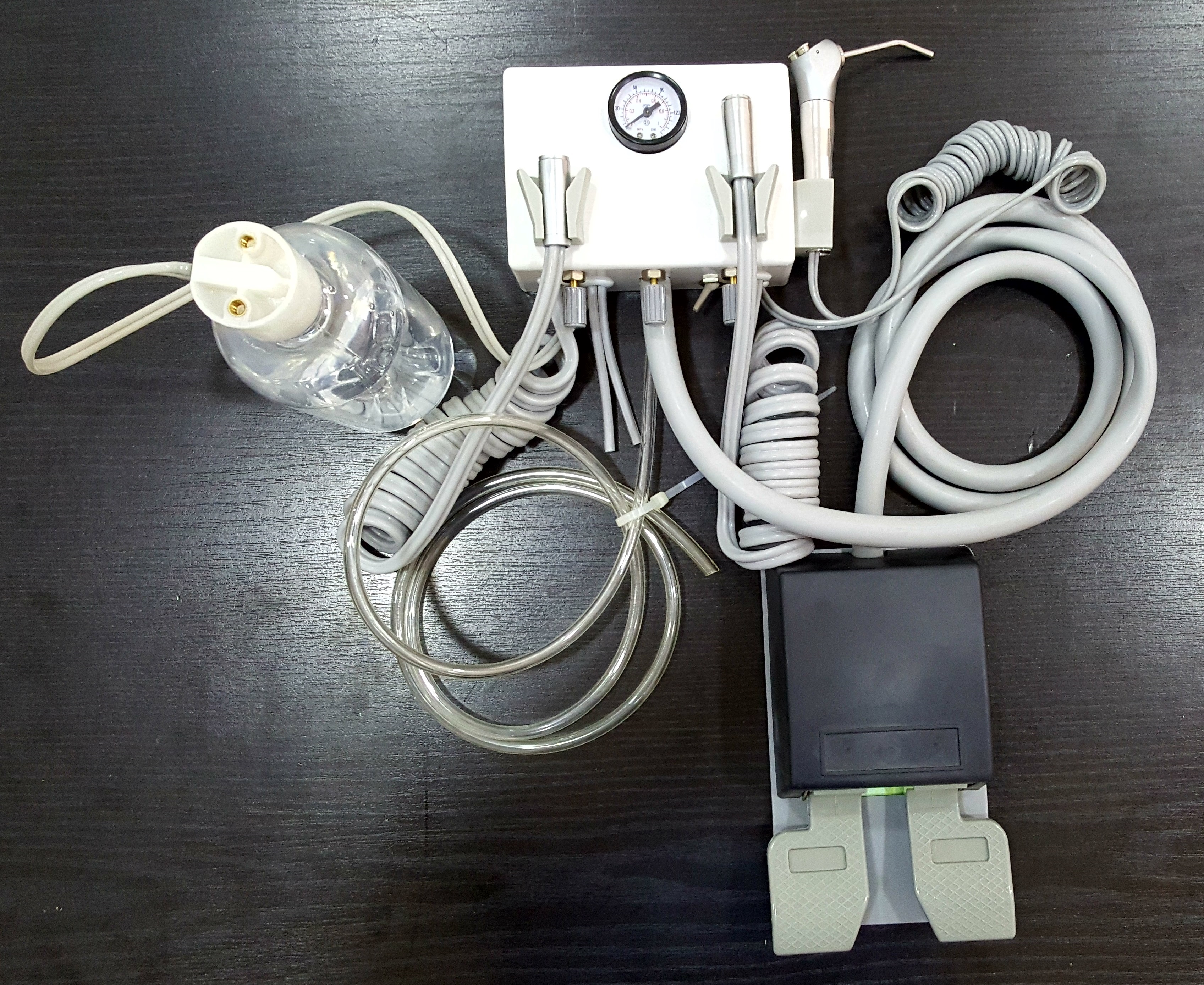 aparato dental compacto